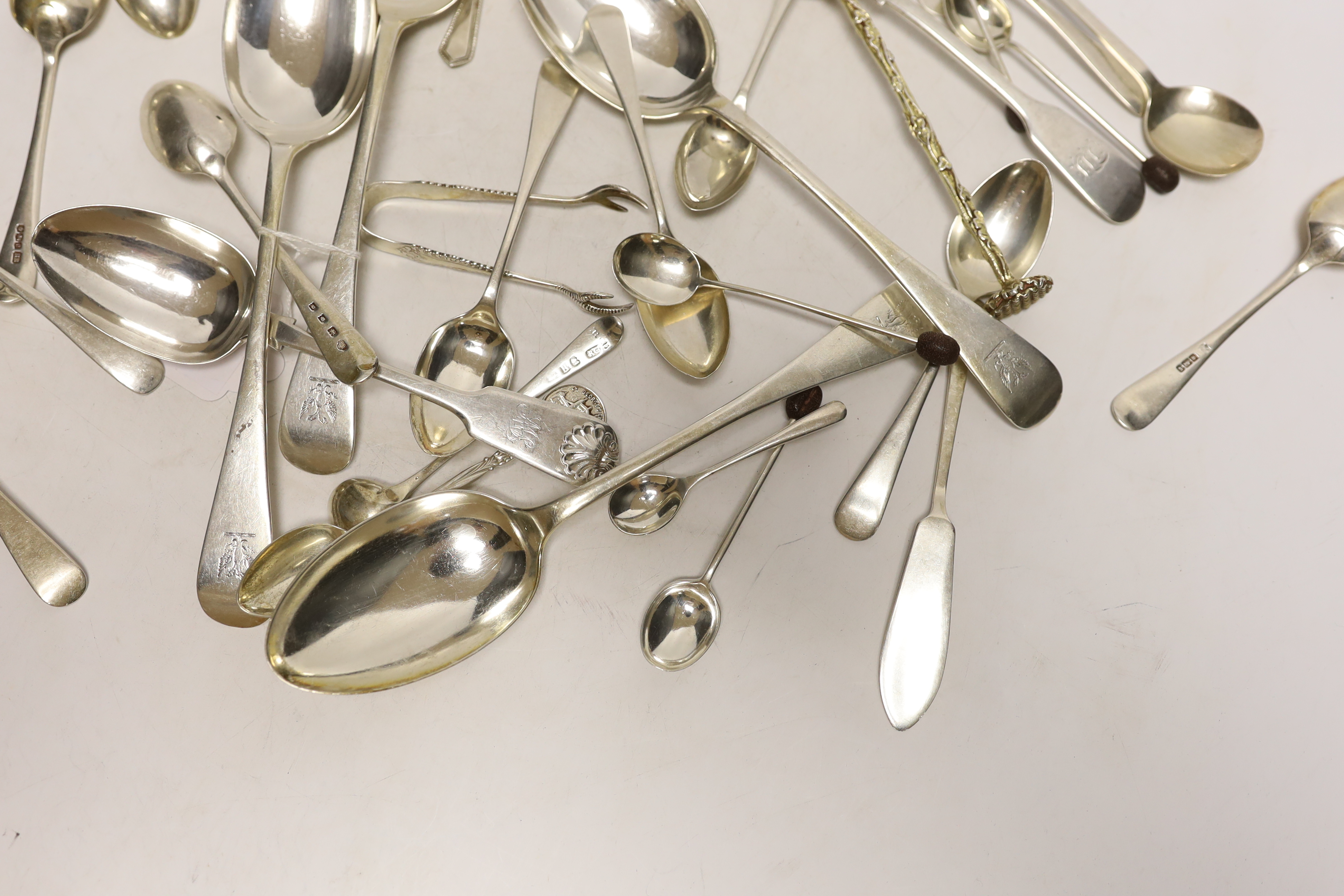 A quantity of assorted mainly silver flatware including teaspoons, table spoons, condiment spoons etc.